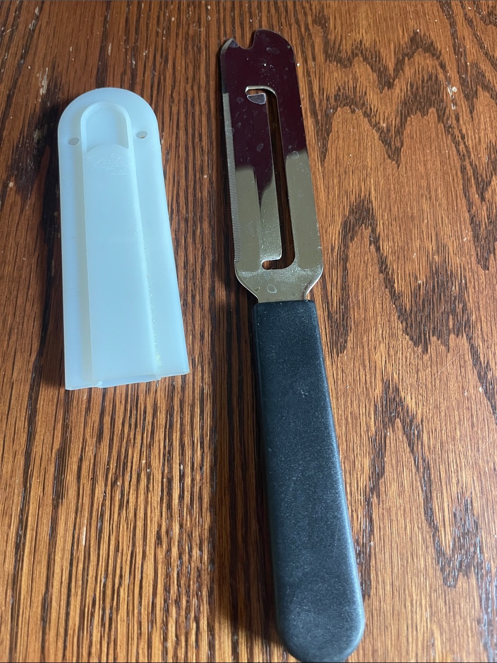 Pampered Chef Cheese Knife with Black Handle and White Sheath